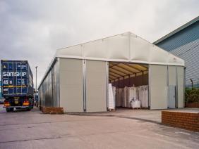 Thermo-roof temporary storage building