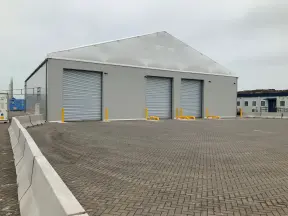 Building with 3 roller doors