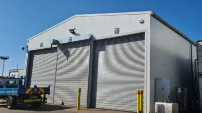 Grey workshop with multiple roller doors