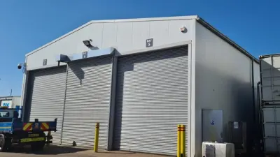 Grey workshop with multiple roller doors