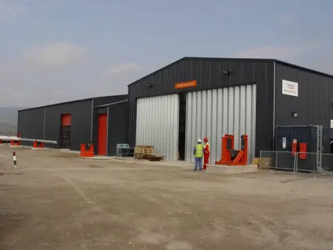 Supplied with 14mtr wide x 5.5mtr high sliding doors for X-Ray machine access